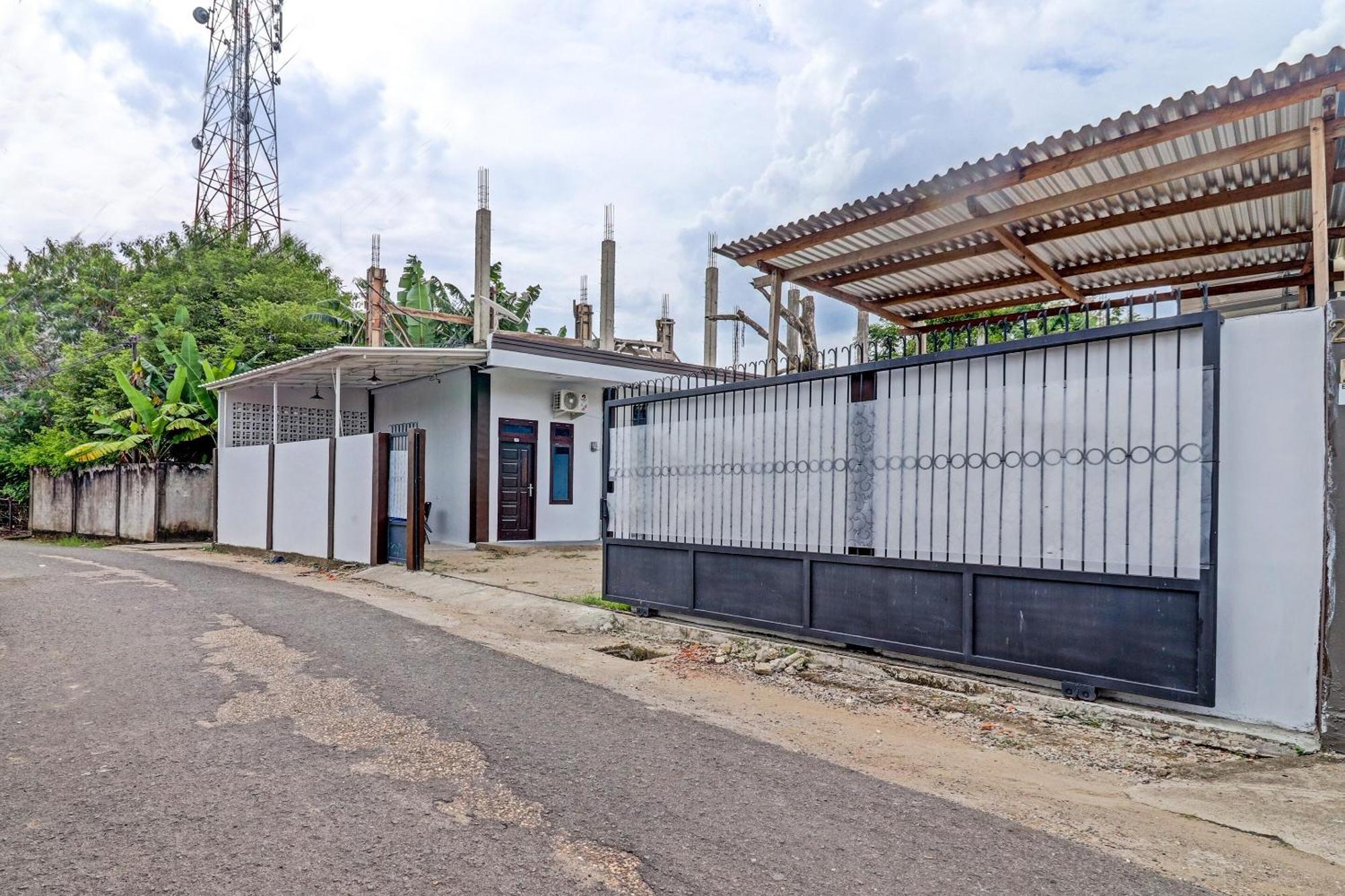 Super Oyo 91497 Waskita Residence Syariah Jambi Buitenkant foto